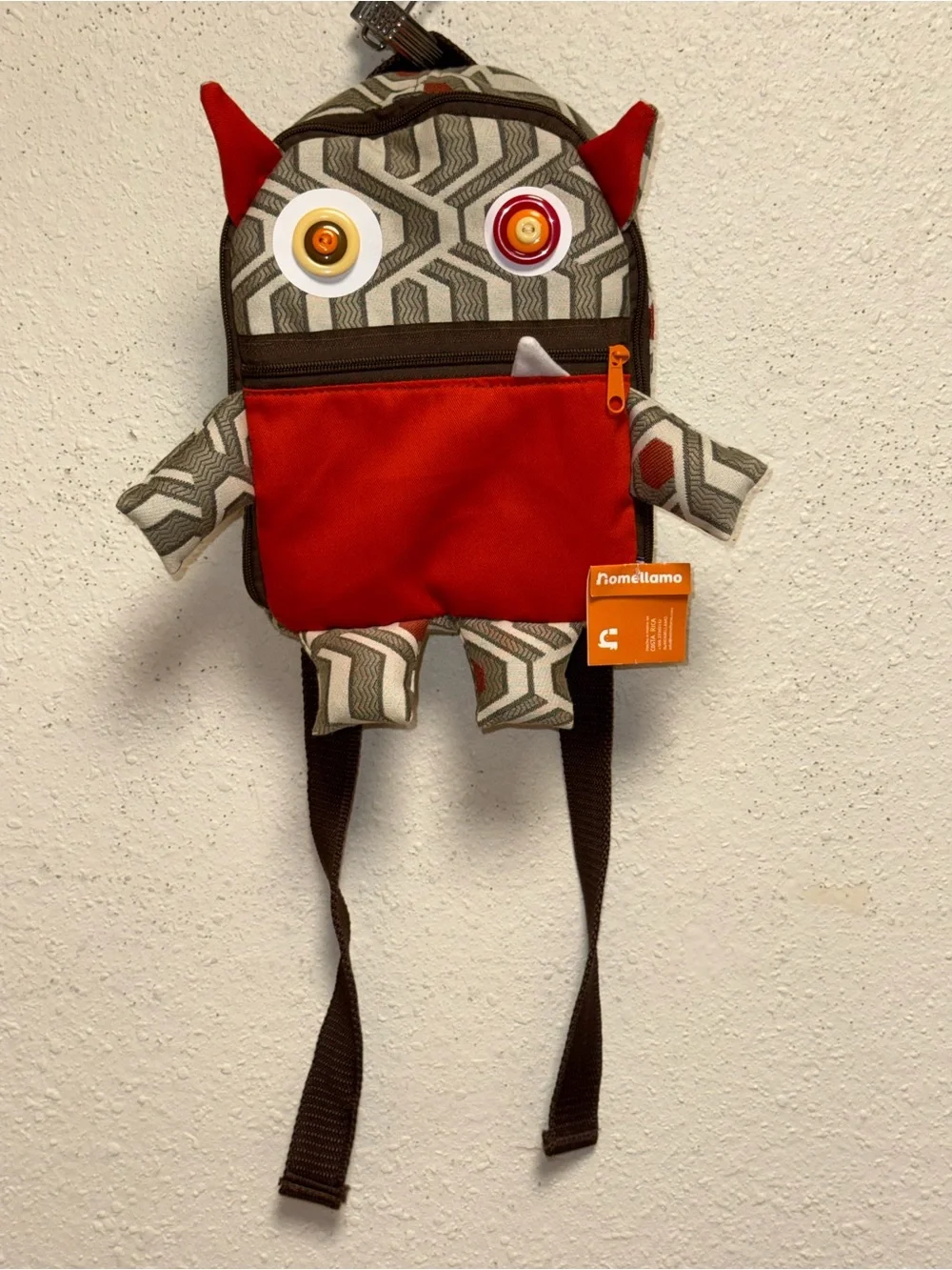 Playful Red Monster Kids Backpack with Geometric Pattern
